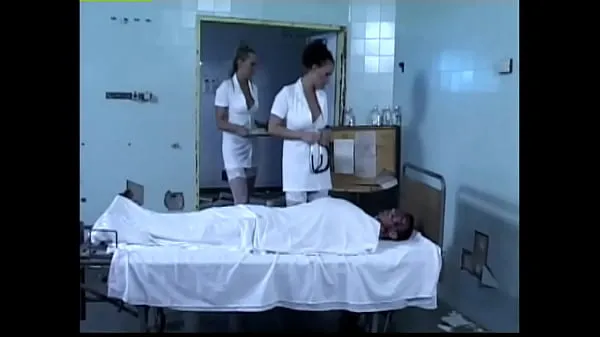 XXX Two horny nurses play with a patient's cock warme films